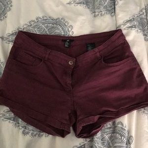 Burgundy colored mid waisted shorts